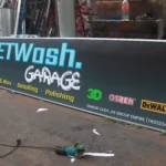 Modern business signboard design for storefront branding and advertising